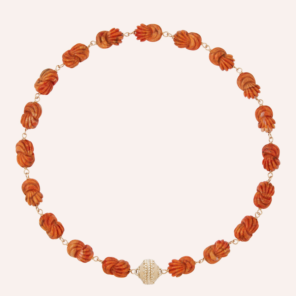 Caspian Apple Coral Carved Knot Necklace