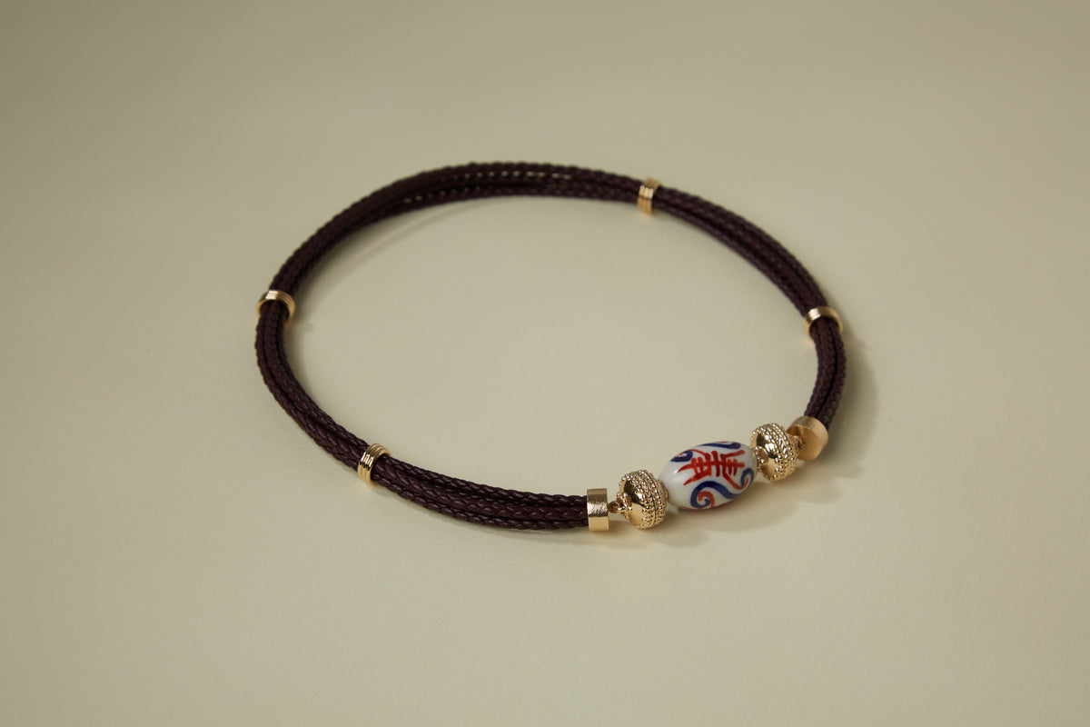 Ceramic Orange and Navy "Longevity" Centerpiece