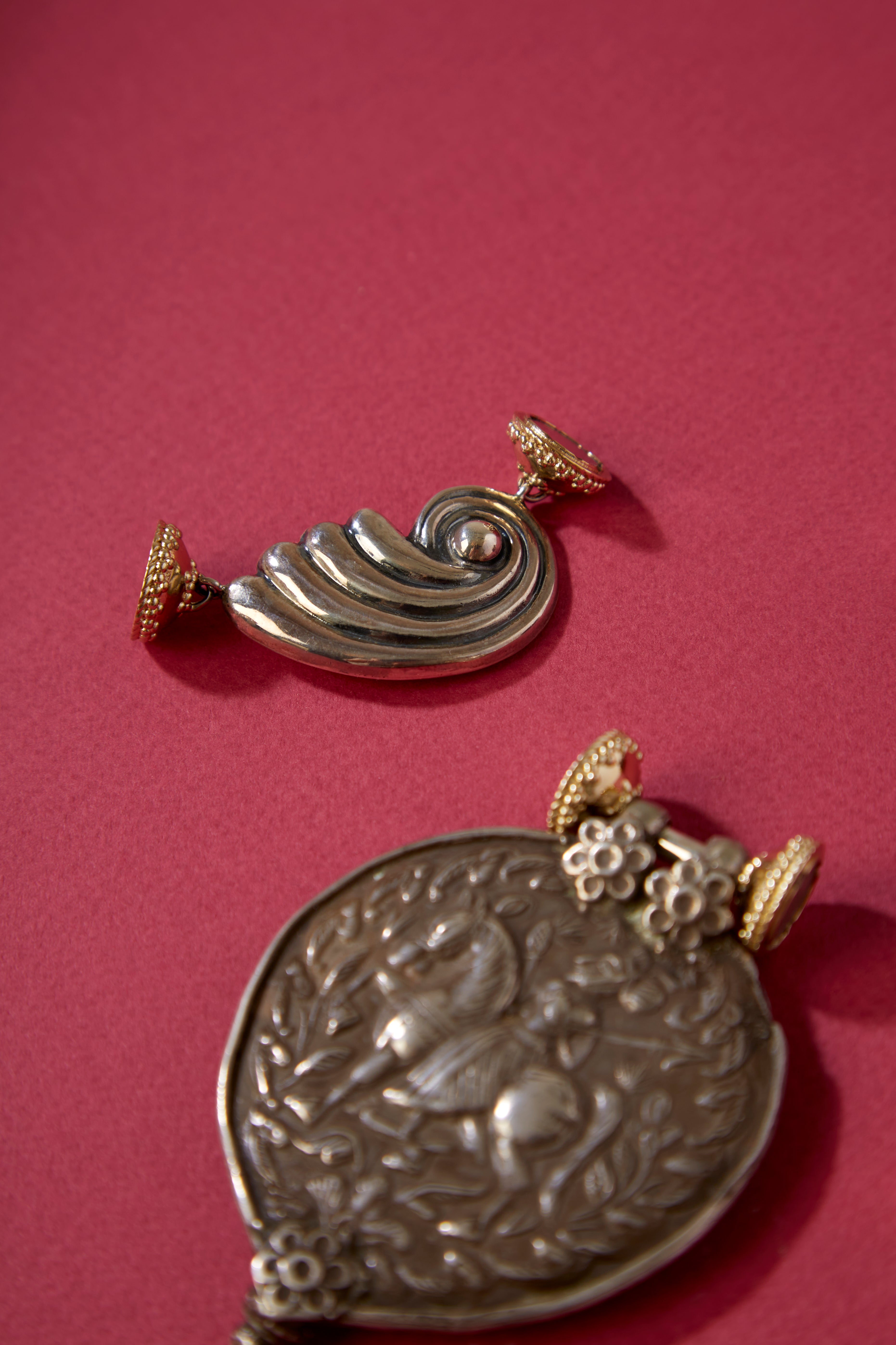 Tibetan Treasure Sterling Silver Left Wave Centerpiece