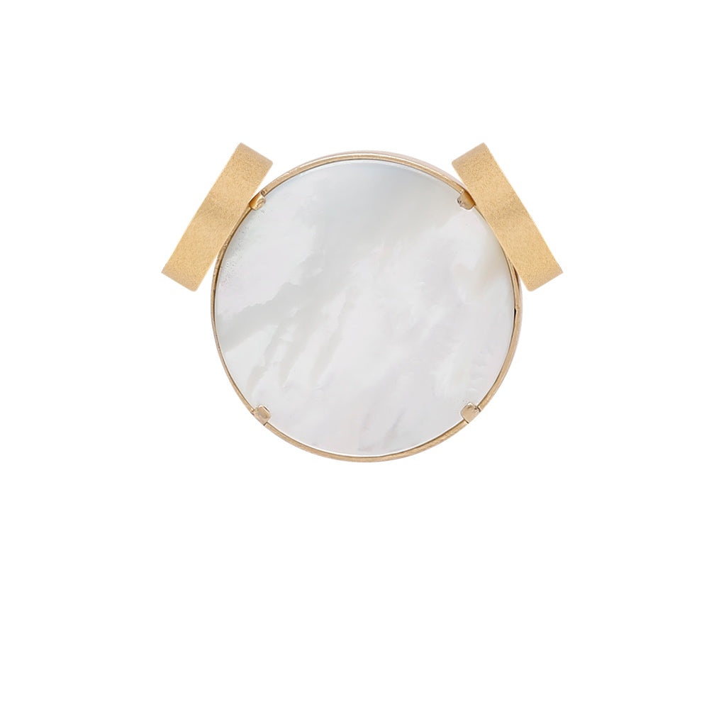 a white tennis racket sitting on top of a table 